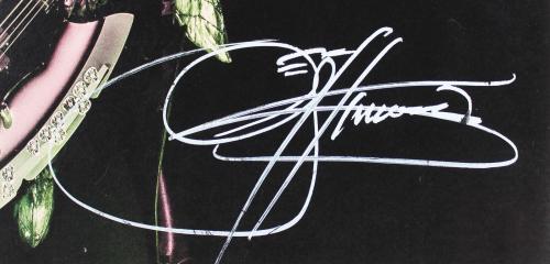 Gene Simmons KISS Signed 11x17 Horizontal Photo JSA #UU44586