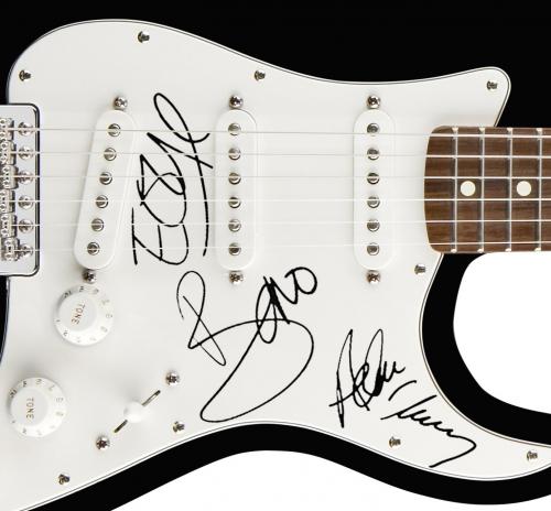 U2 Autographed Facsimile Signed Guitar