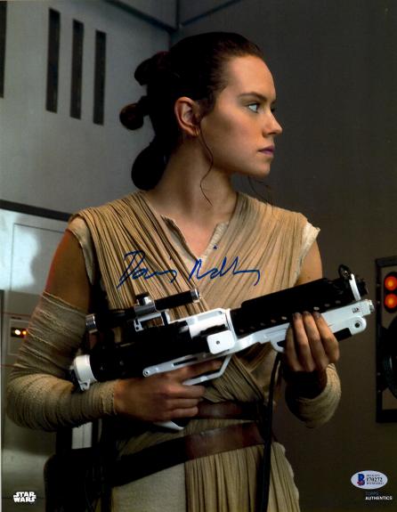 Daisy Ridley Autographed 11" x 14" Star Wars The Force Awakens Holding Storm Trooper Blaster Photograph - Beckett