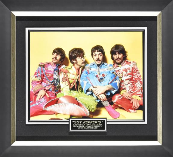 John Lennon, Paul McCartney, Ringo Starr, and George Harrison
Framed 31×28