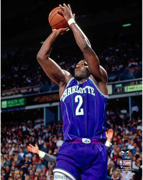 Larry Johnson Charlotte Hornets Unsigned Purple Alternate Jersey Jumpshot Photograph