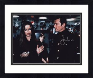 Autographed PSA DNA Witness 3 Roger Moore Signed James Bond 007 Photo 11x14 