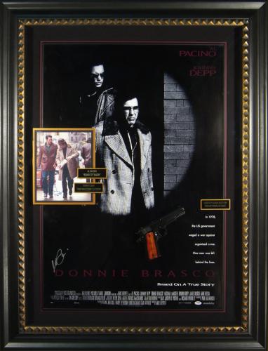 Signature display featuring a movie scene photograph signed by Johnny Depp and a Donnie Brasco movie poster signed by Al Pacino.
Framed 40×52